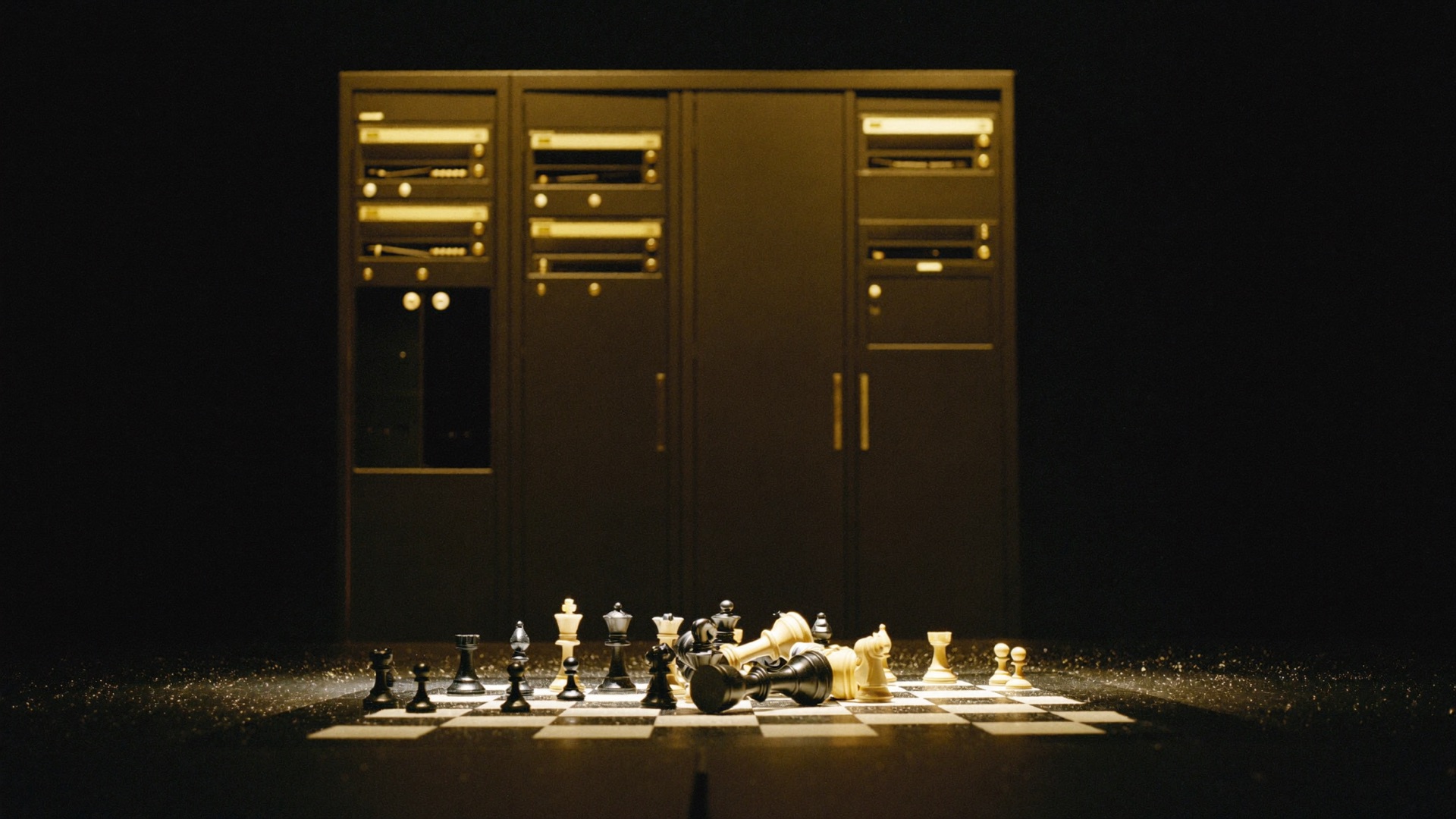 A toppled black king on a spotlit chessboard before dark supercomputer cabinets